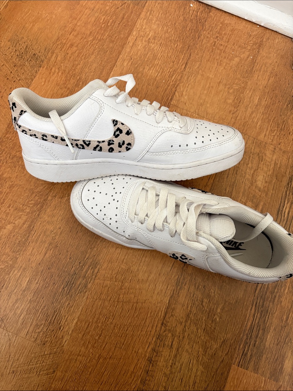 Nike Women's White Low-Top Sneakers with Leopard Swoosh